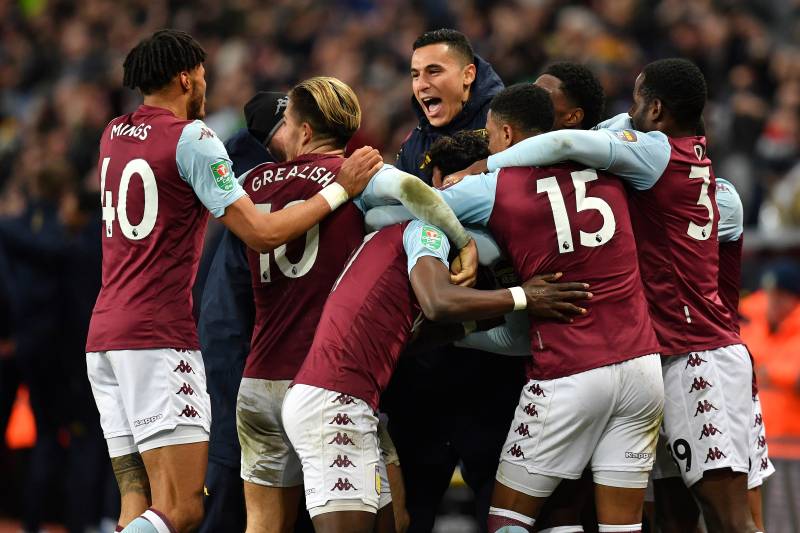 Players celebrate after victory