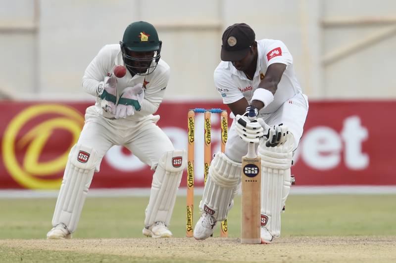 Kusal Mendis plays a defensive shot