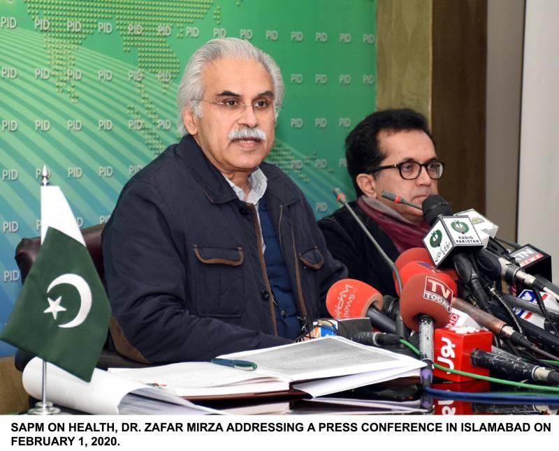 Dr Zafar Mirza talking to media