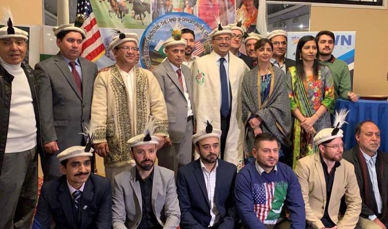 Participants pose for a photo at Gilgit-Baltistan Cultural Event