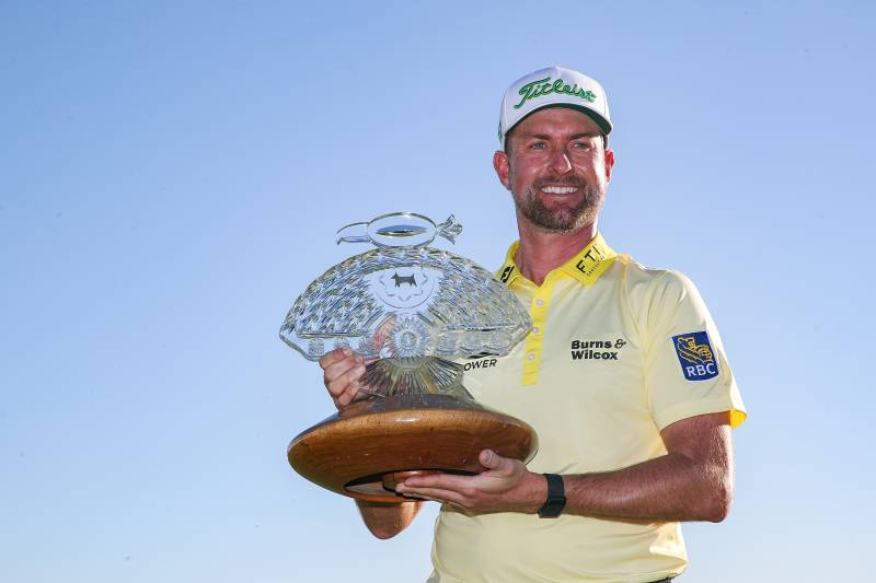 Webb Simpson poses with the Waste Management Phoenix Open.