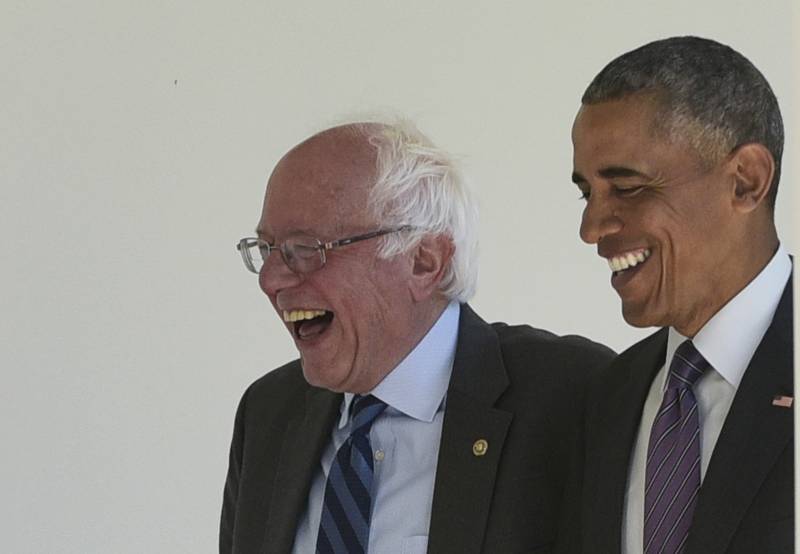 Obama absent from Democratic White House race but looming large