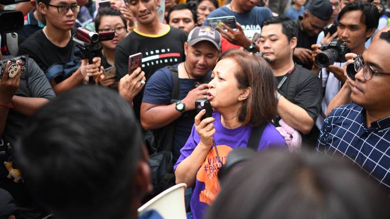 Malaysian police quiz Mahathir's daughter over protest