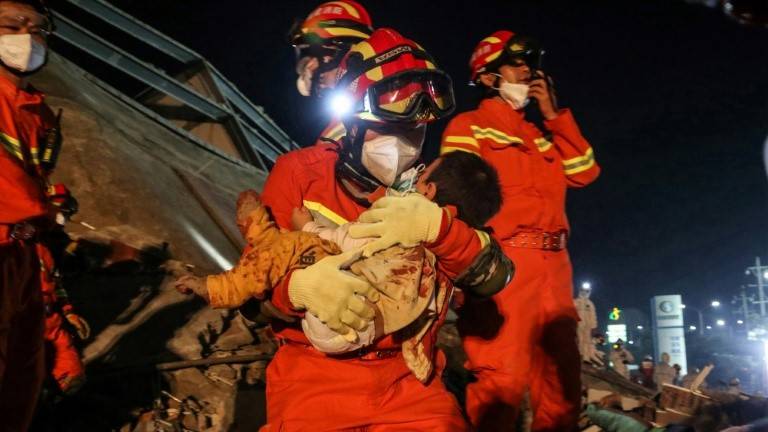 China quarantine hotel collapse kills six