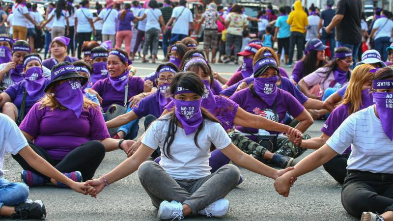 Thousands rally in Asia for Women's Day despite virus fears