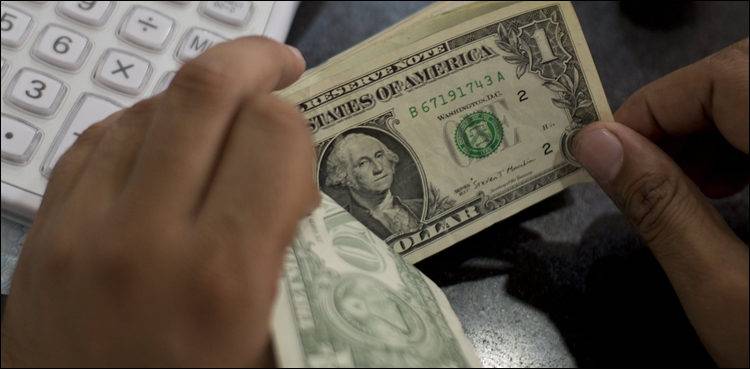 Dollar hits 8-month high against rupee