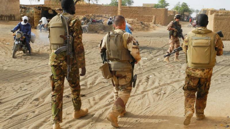 Gunmen kill 10 and burn down village in restive central Mali