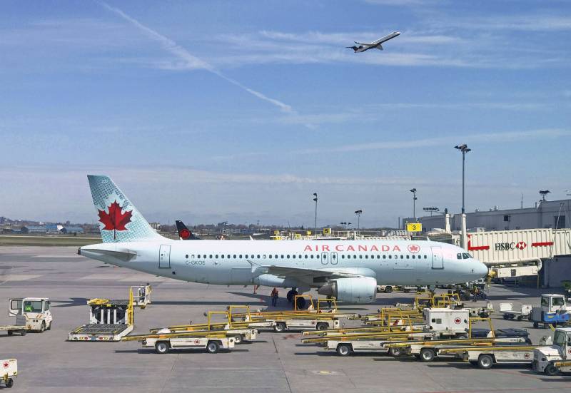 Air Canada to temporarily lay off 5,000 flight attendants