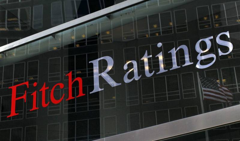 Fitch downgrades UK debt to AA-, outlook negative