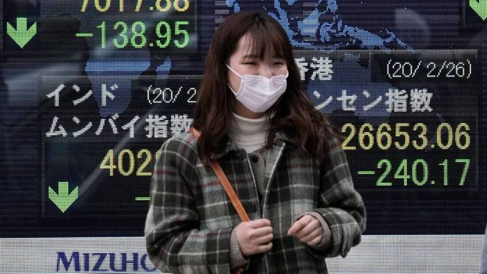 Asian markets boosted by hopes on virus but oil dips