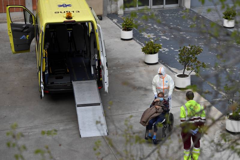 Spain to hand out masks at metro stations as people return to work