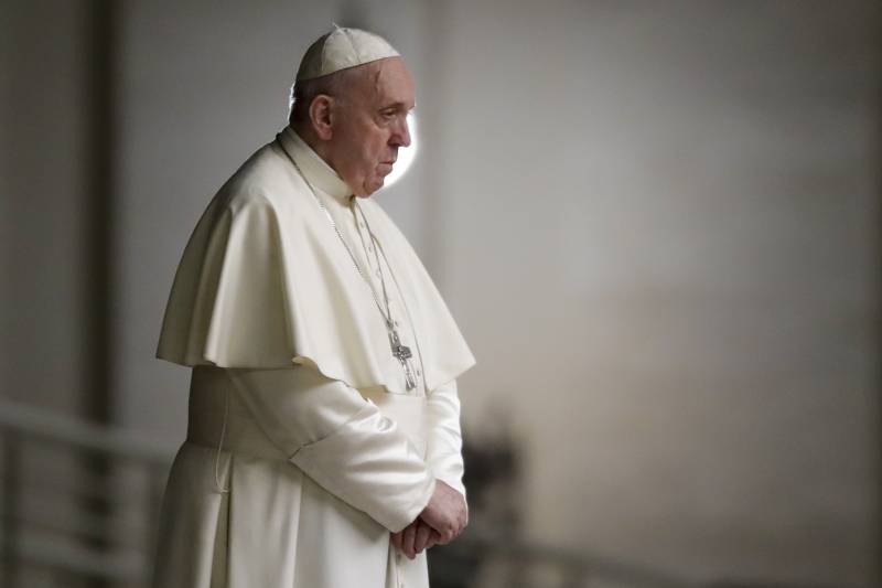 Pope presides over haunting Good Friday procession under lockdown