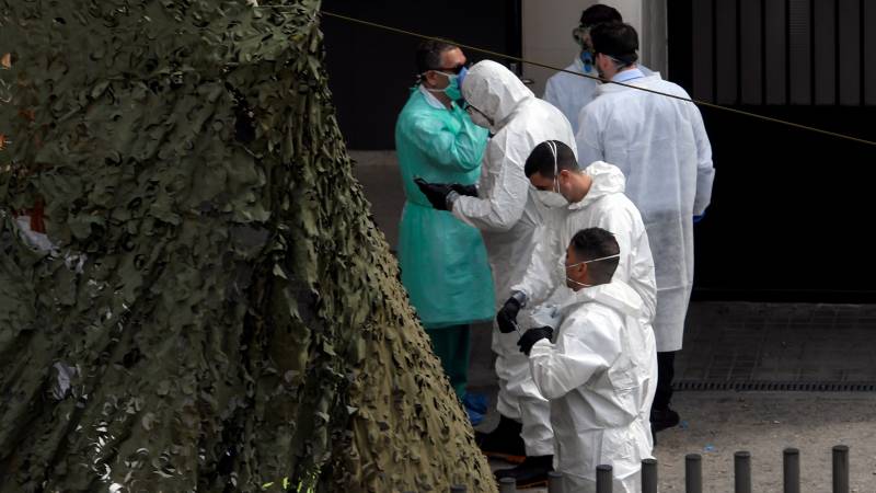 Spain's daily virus toll rises again with 619 dead