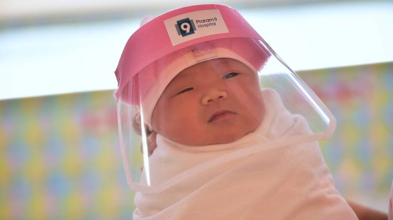 Thai medics protect babies born in a pandemic with face shields