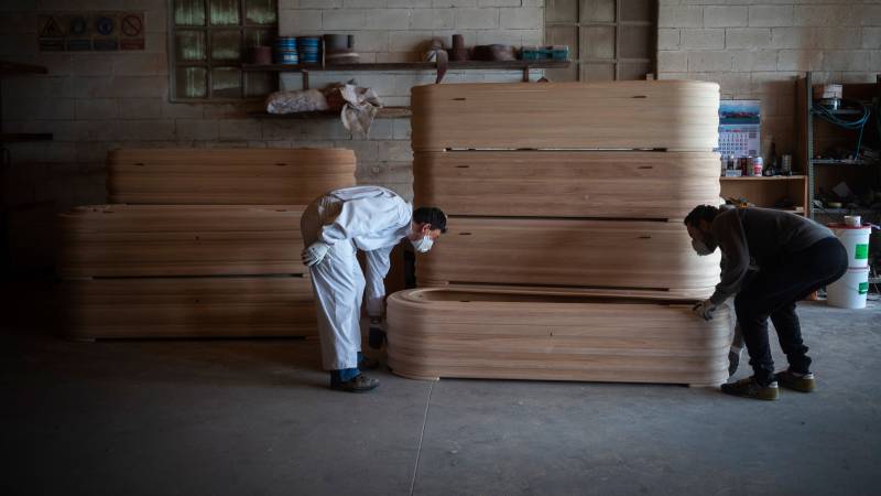 Spain village churns out coffins as death doubles demand