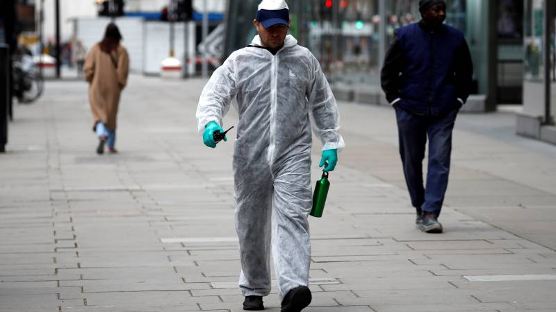 UK virus death toll rises to over 14,500