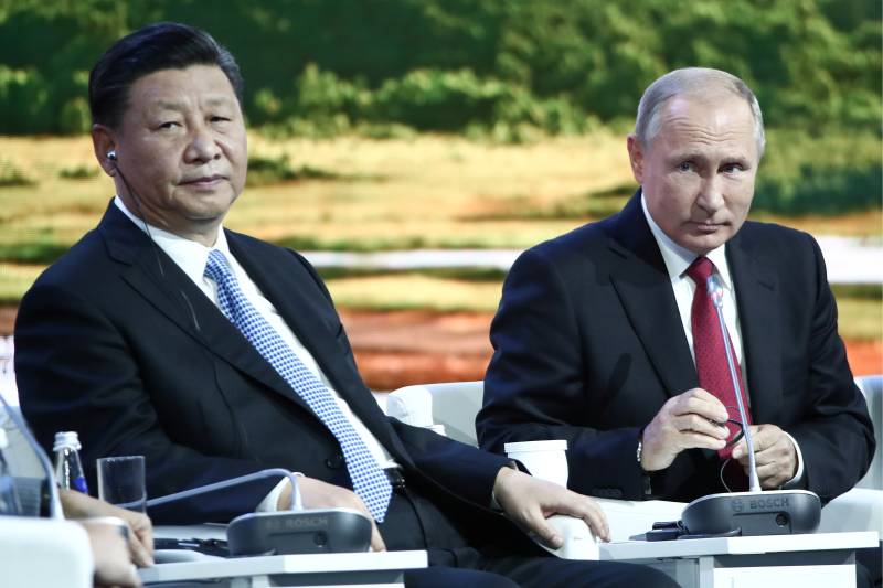 Putin, Xi slam attempts to blame China for late virus response