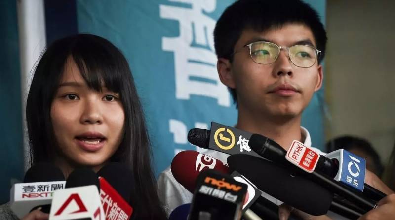 Hong Kong activists arrested over last year's democracy rallies