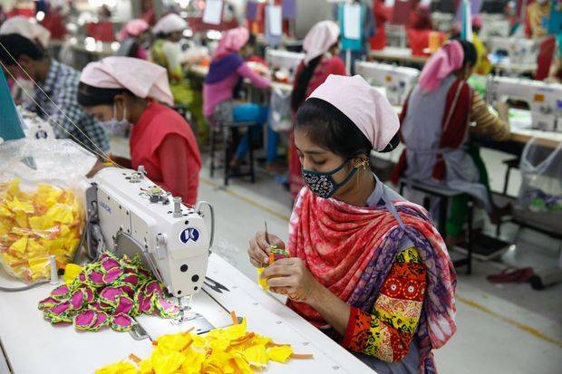 Bangladesh garment factories reopen, defying virus lockdown