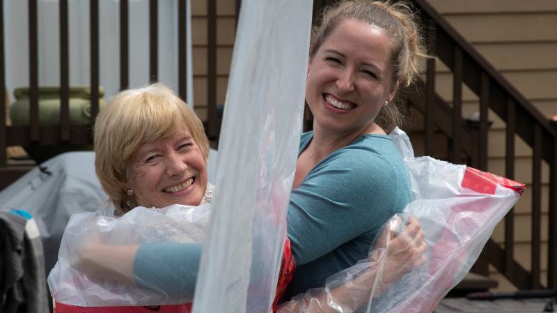 'Hug glove' gives Canada family bit of normalcy in pandemic