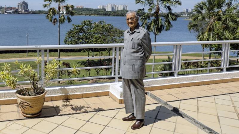 Keeping fit, going hi-tech: Malaysia's Mahathir, 94, in lockdown