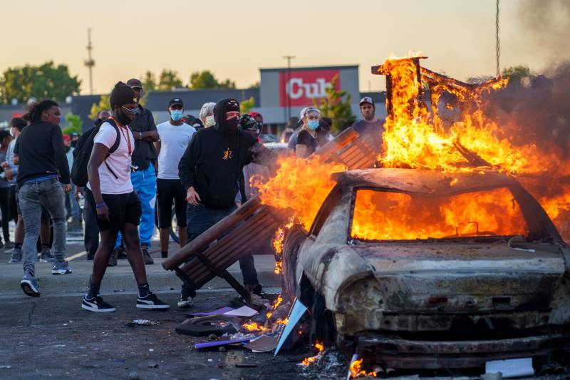 Flames engulf US police station as black rights unrest spreads