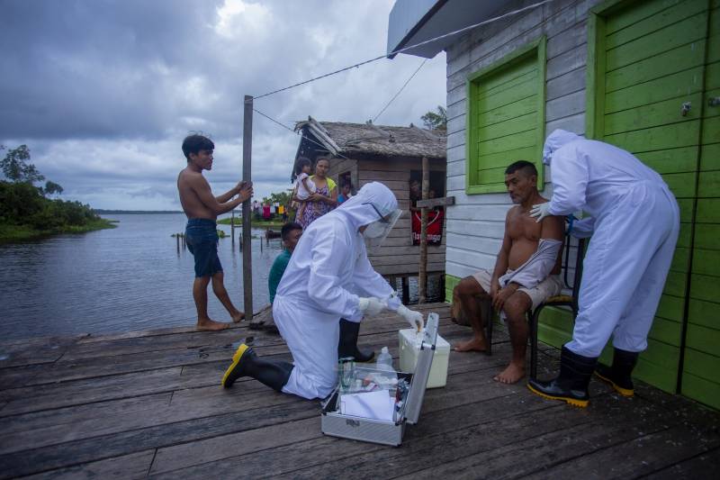 Brazil resumes publishing virus toll, criticizes WHO