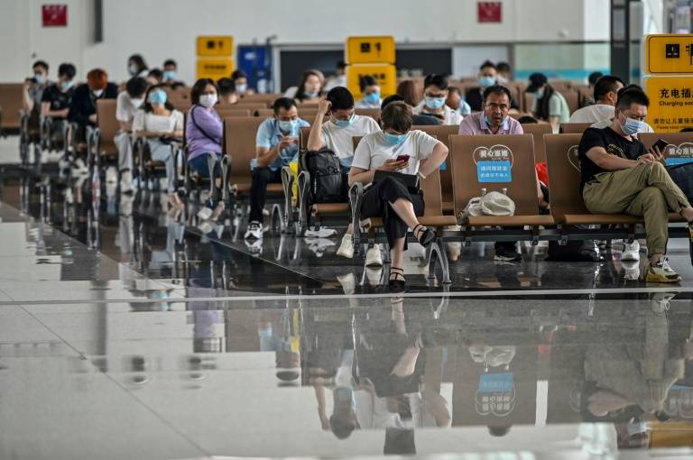 The future of flying: Face masks, health checks and long check-ins