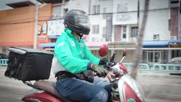 Pilot, grounded by Covid-19, shifts to motorbike food deliveries