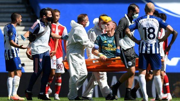 Arsenal keeper Leno stretchered off in agony off at Brighton