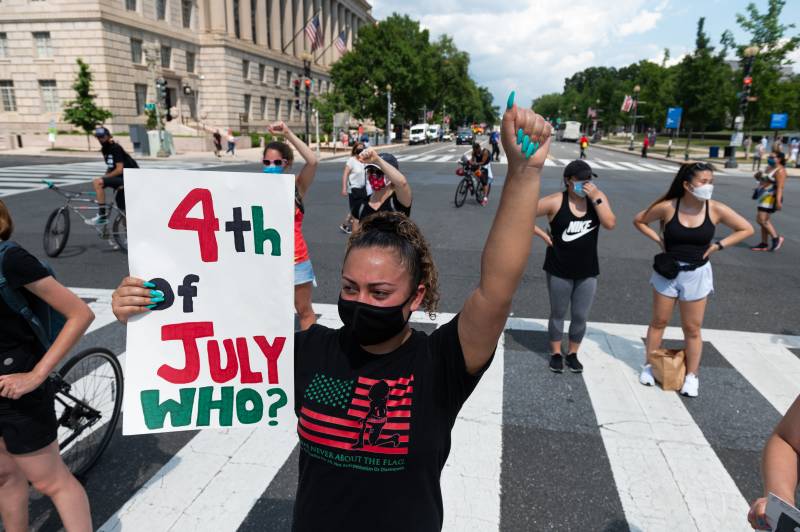 Independence Day marked by division on the streets of Washington