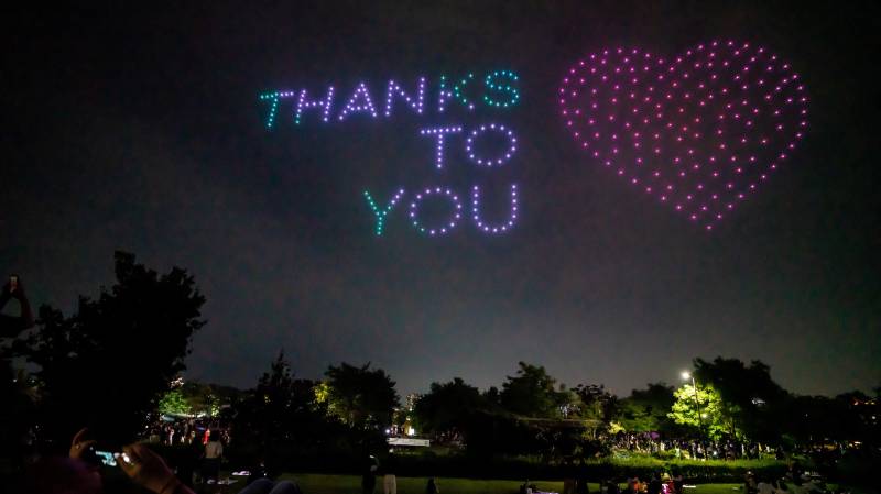 Hundreds of drones light up Seoul sky with virus messages