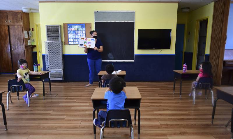 Parents face dilemma as US schools seek to reopen