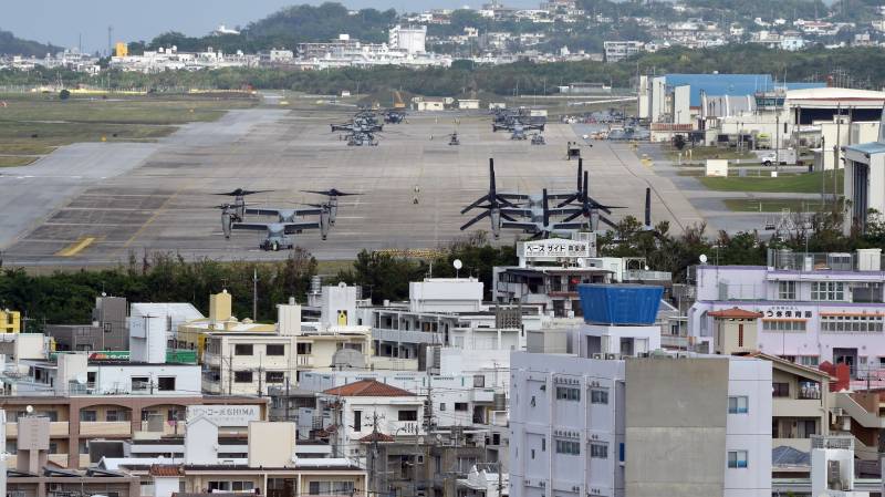 US bases on Okinawa locked down over virus spike