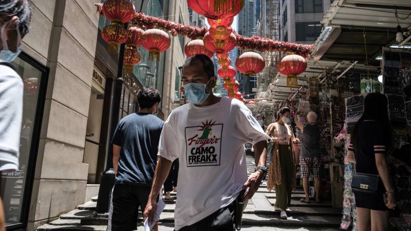 Success story Hong Kong reimposes tough new virus restrictions