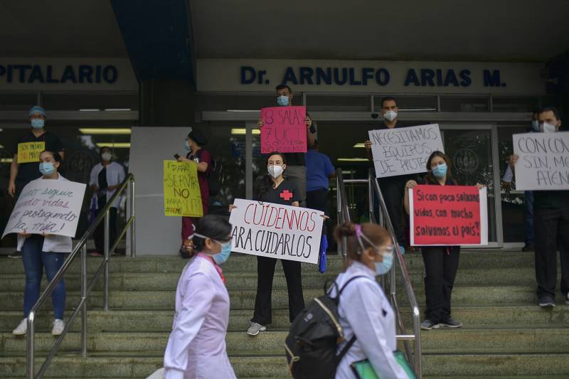 Spain's exhausted medics demand post-virus job security