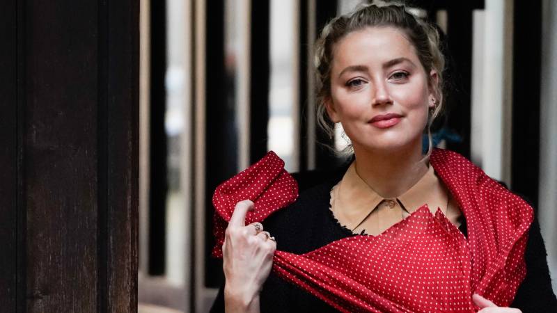 Amber Heard says Johnny Depp threw bottles at her 'like grenades'