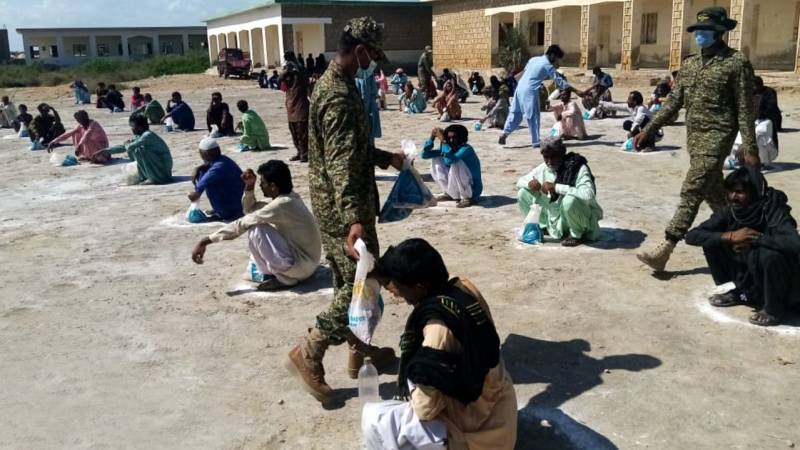 Pakistan Navy distributes ration amongst deserving families during Eid ul Adha