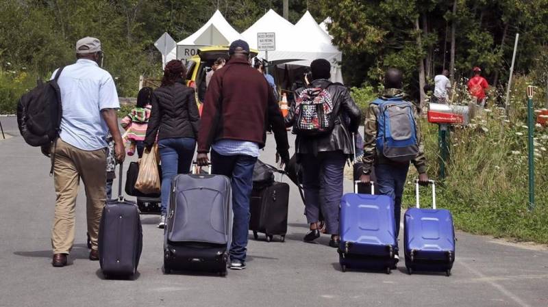 Asylum seekers on virus frontlines to get Canada residency