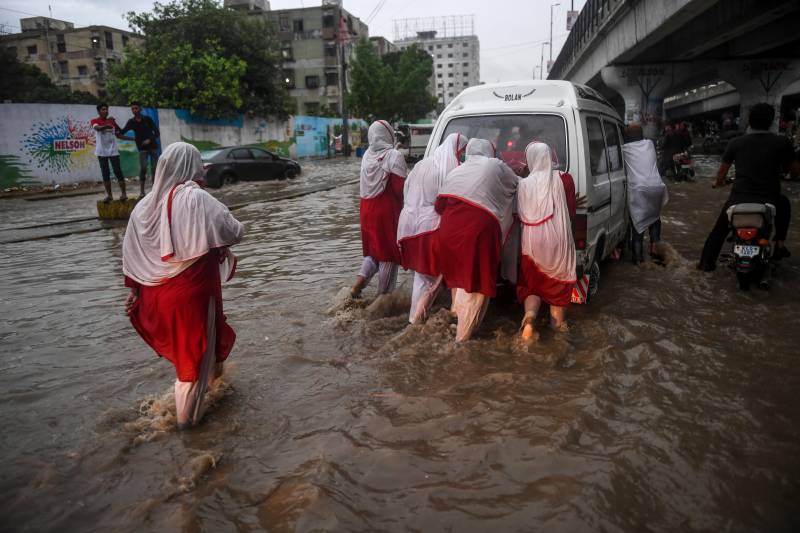 Karachi paralysed as 173mm of rain in one hour sinks Surjani Town