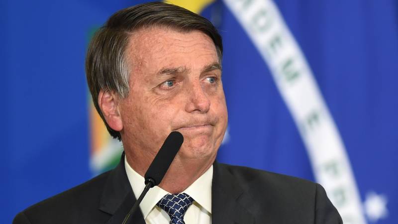 Brazil's Bolsonaro threatens to punch reporter in the mouth