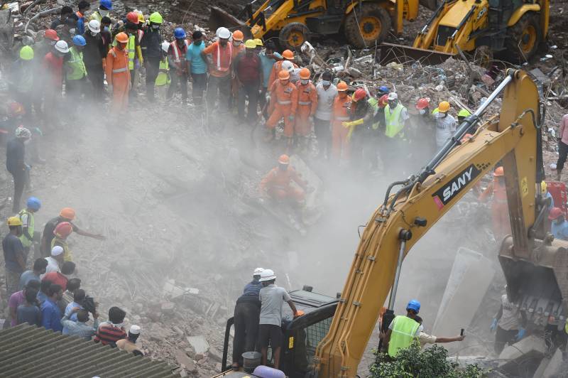 India rescuers pull 4-year-old survivor from collapsed building