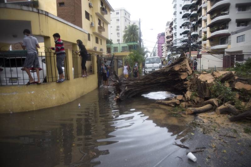 Laura lashes Cuba, expected to become hurricane by US landfall