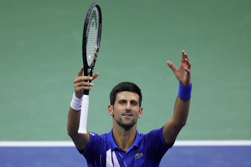 Djokovic through to last 16 as bizarre delay shrouds US Open