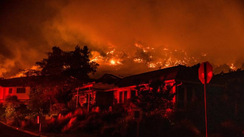 Tens of thousands flee wildfires roaring through California wine regions