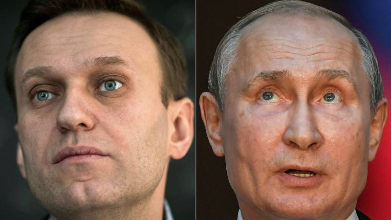 Vowing return to Russia, Navalny accuses Putin over poisoning