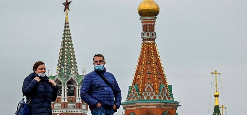 Russia reports record virus cases but shuns new restrictions