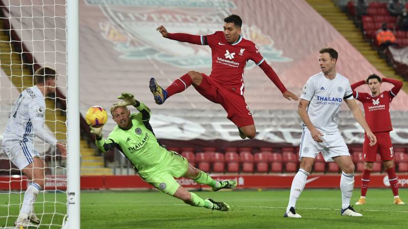 Injury-hit Liverpool keep setting records, 10-man Arsenal hold Leeds