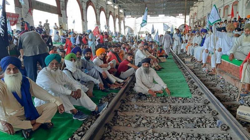 India farmers block railway tracks, roads in national action against new laws