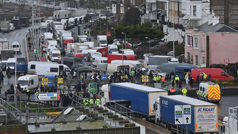 Britain, France ease transport ban as virus variant threatens supply chains